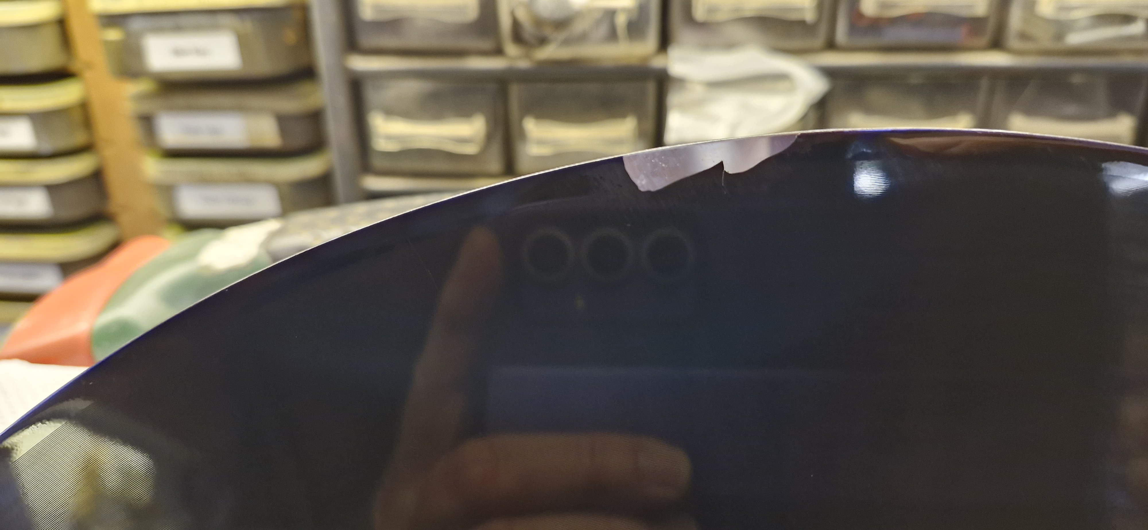 Acetate disc with missing outer rim after cleaning